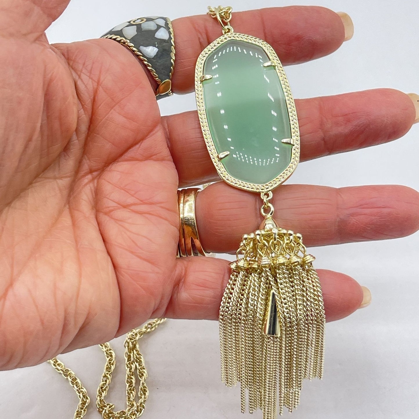 Gold Kendra Scott Necklace With Green Stone & Tassel Pendant
