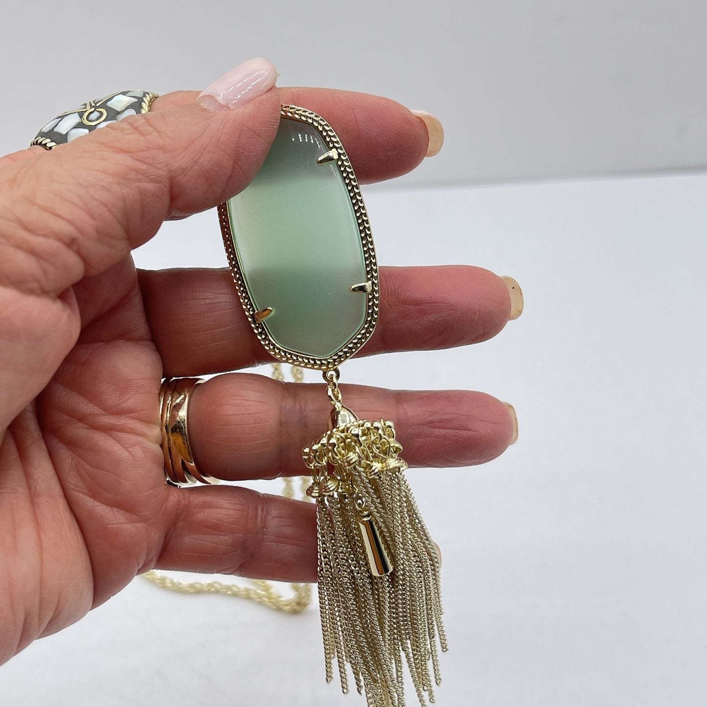 Gold Kendra Scott Necklace With Green Stone & Tassel Pendant