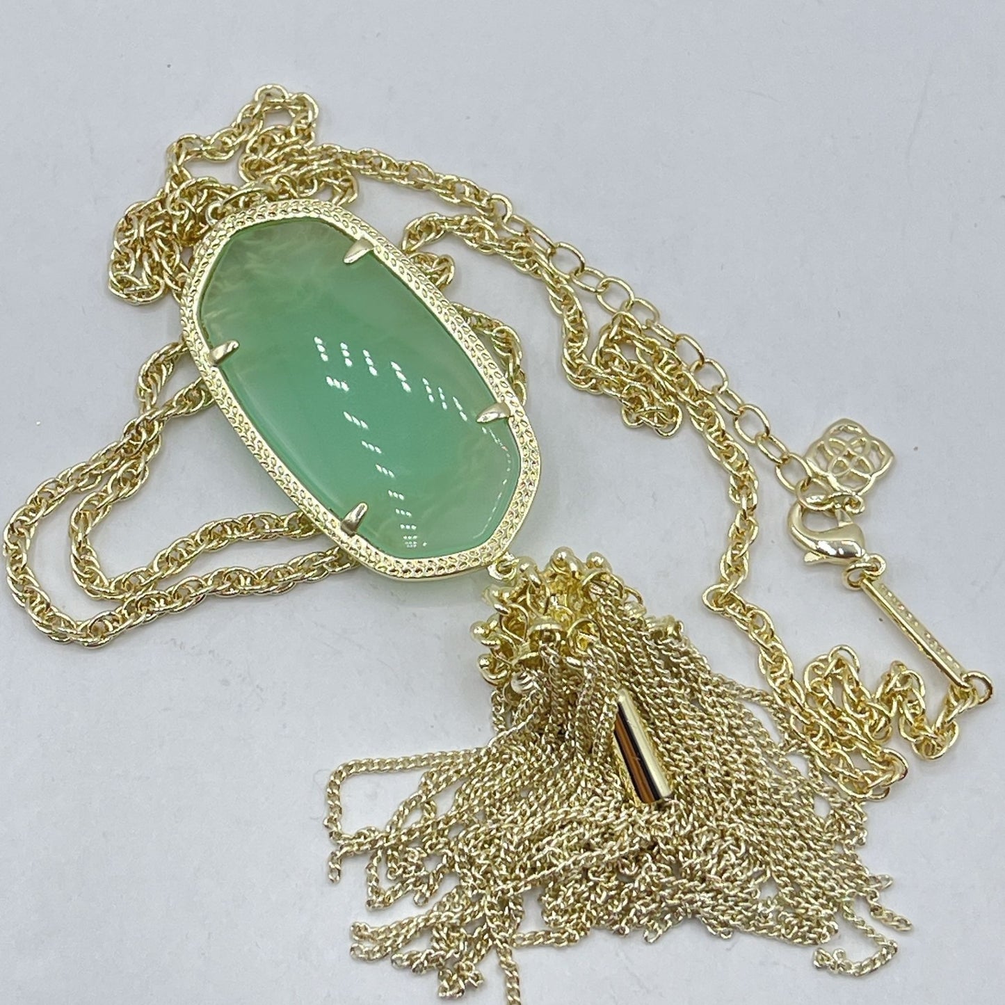 Gold Kendra Scott Necklace With Green Stone & Tassel Pendant