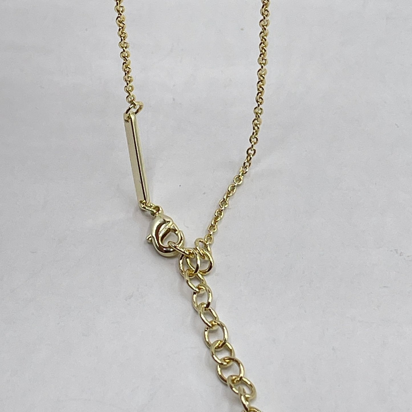 Gold Kendra Scott Necklace With Green Stone & Tassel Pendant