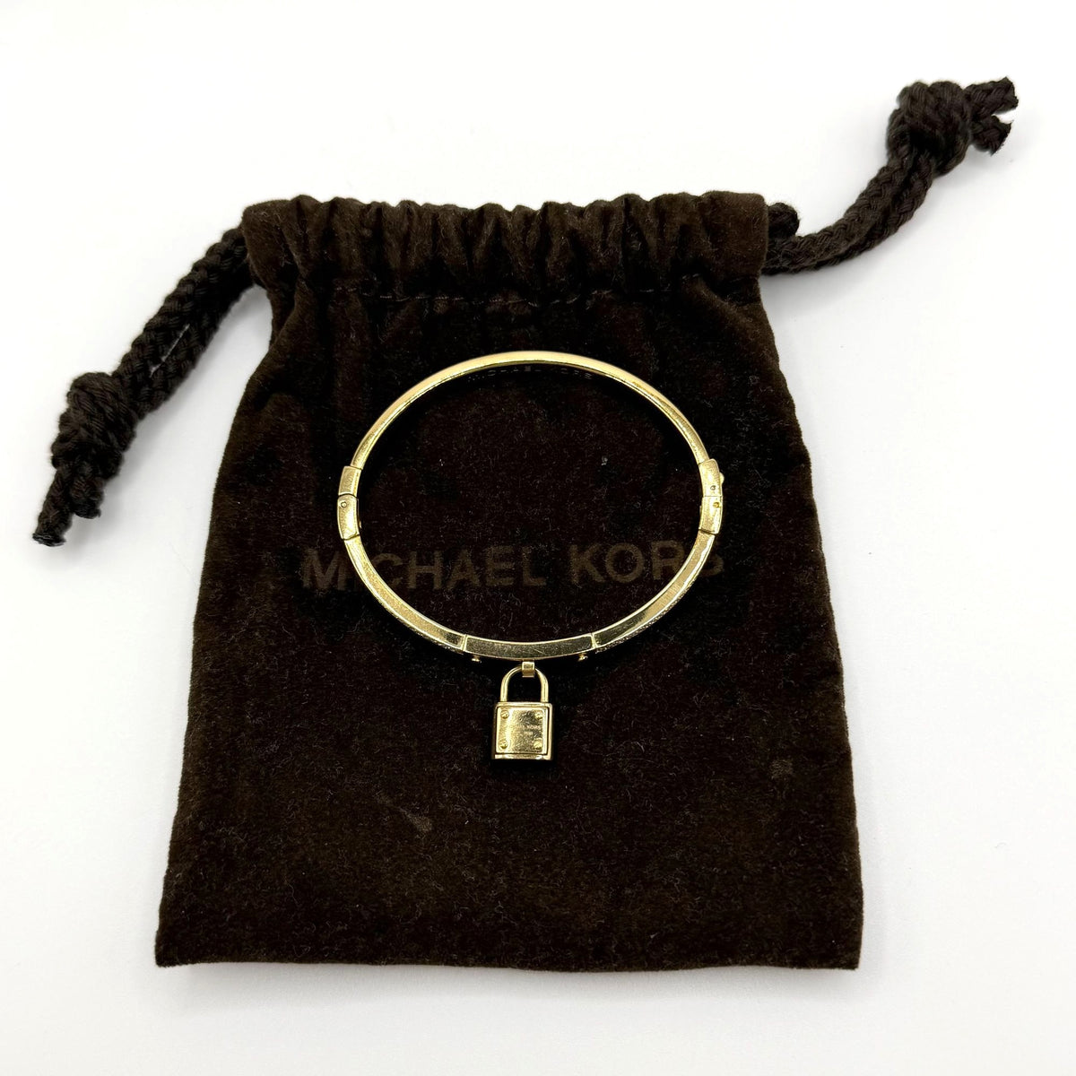 Michael Kors Goldtone Crystal Lock Hinged Bracelet With Pouch