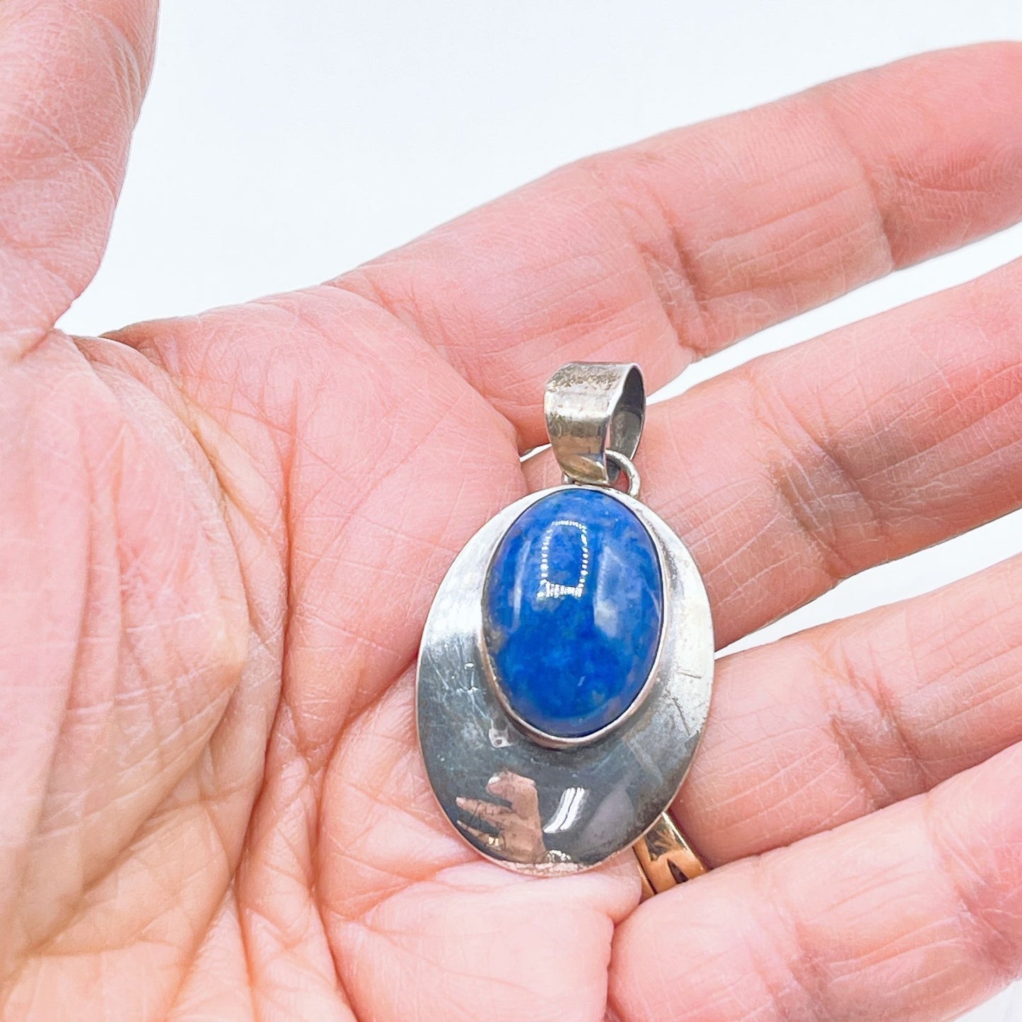 Sterling Silver Oval Pendant With Lapis Lazuli Gemstone Center