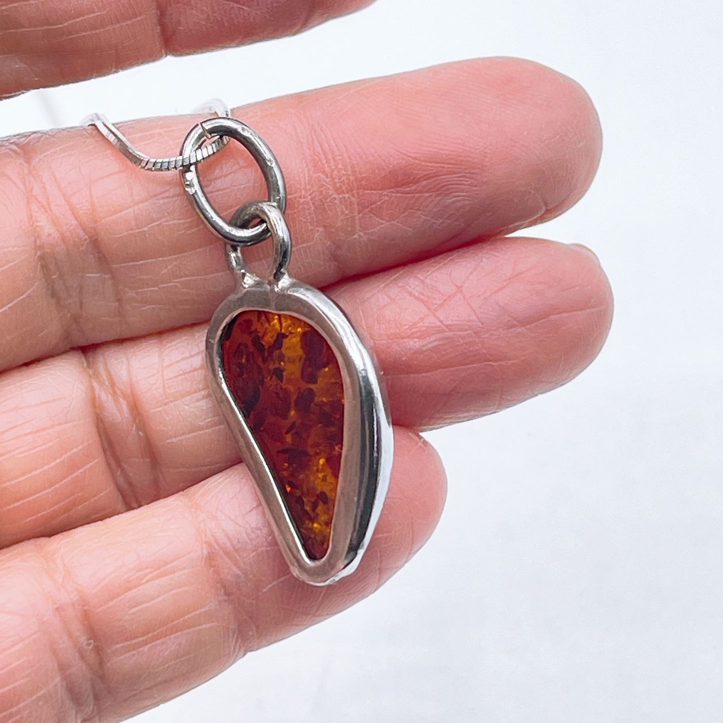 Sterling Silver Pendant Necklace With Genuine Amber Teardrop Design