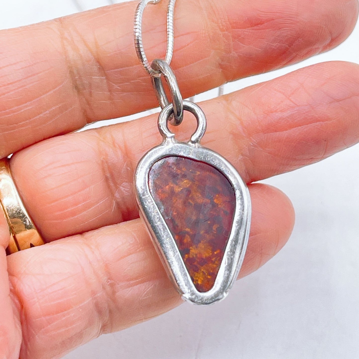 Sterling Silver Pendant Necklace With Genuine Amber Teardrop Design
