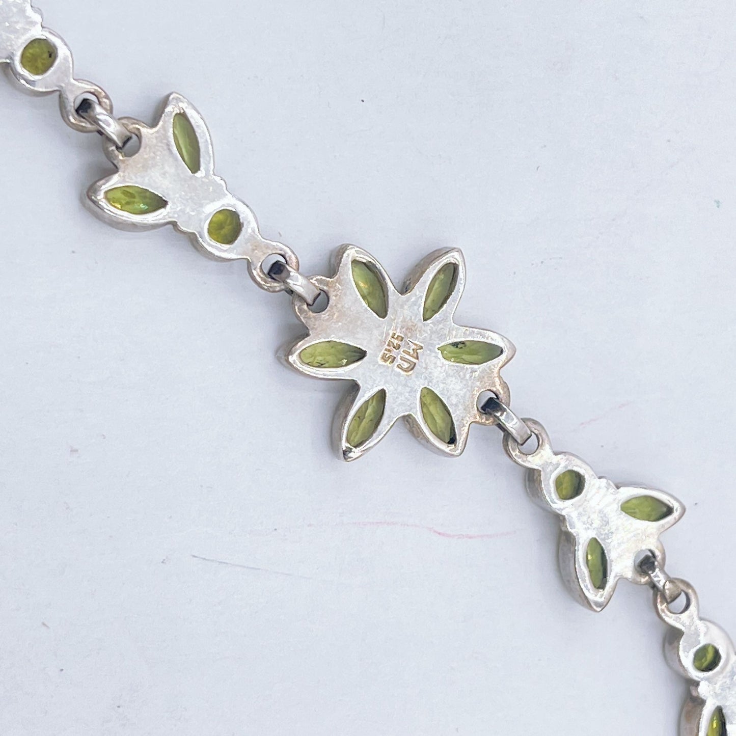 Sterling Silver Faceted Peridot Flower Bracelet With Toggle Clasp