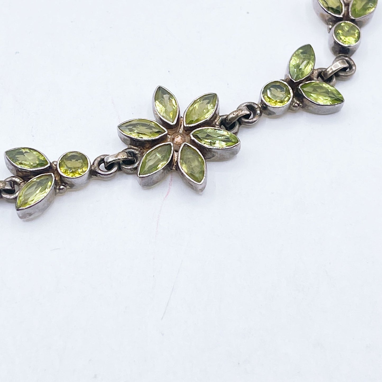 Sterling Silver Faceted Peridot Flower Bracelet With Toggle Clasp
