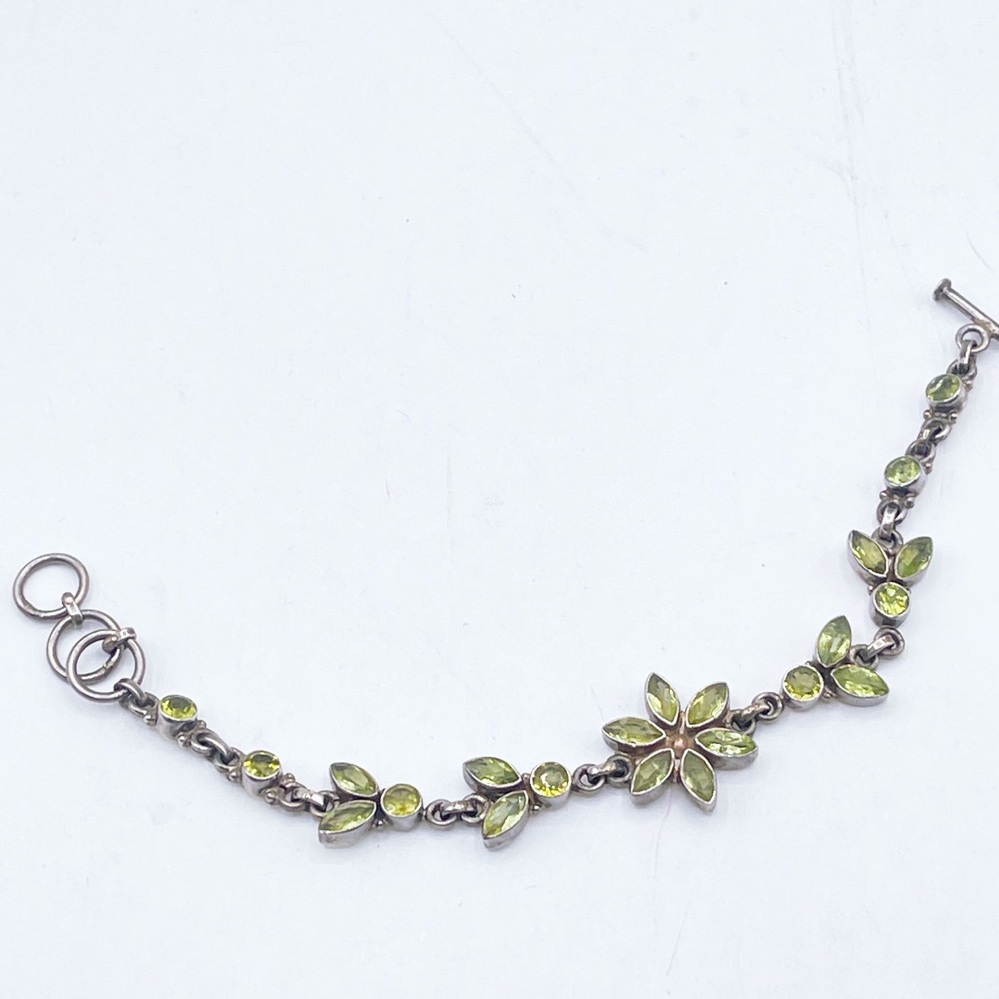 Sterling Silver Faceted Peridot Flower Bracelet With Toggle Clasp
