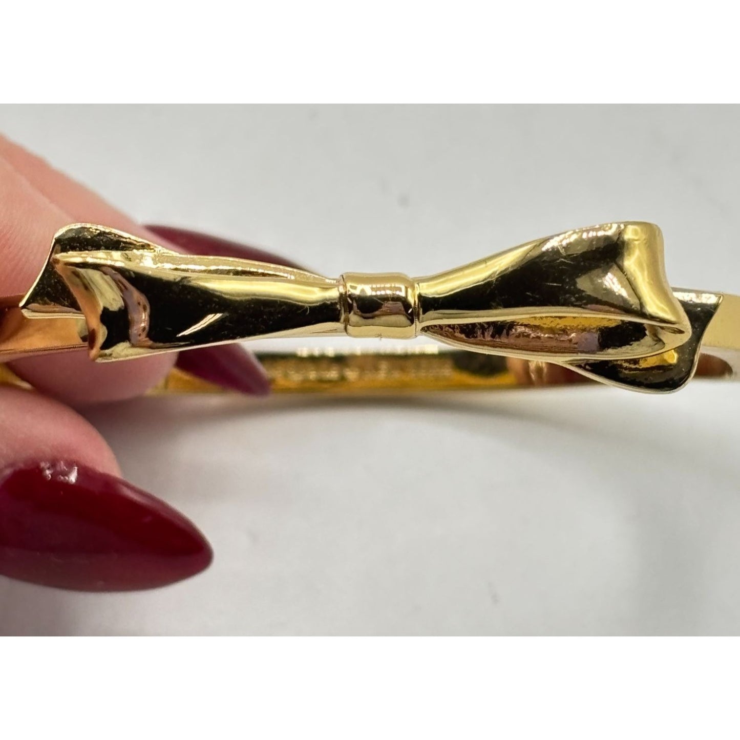 Kate Spade New York Gold-Tone Bow Bangle Bracelet