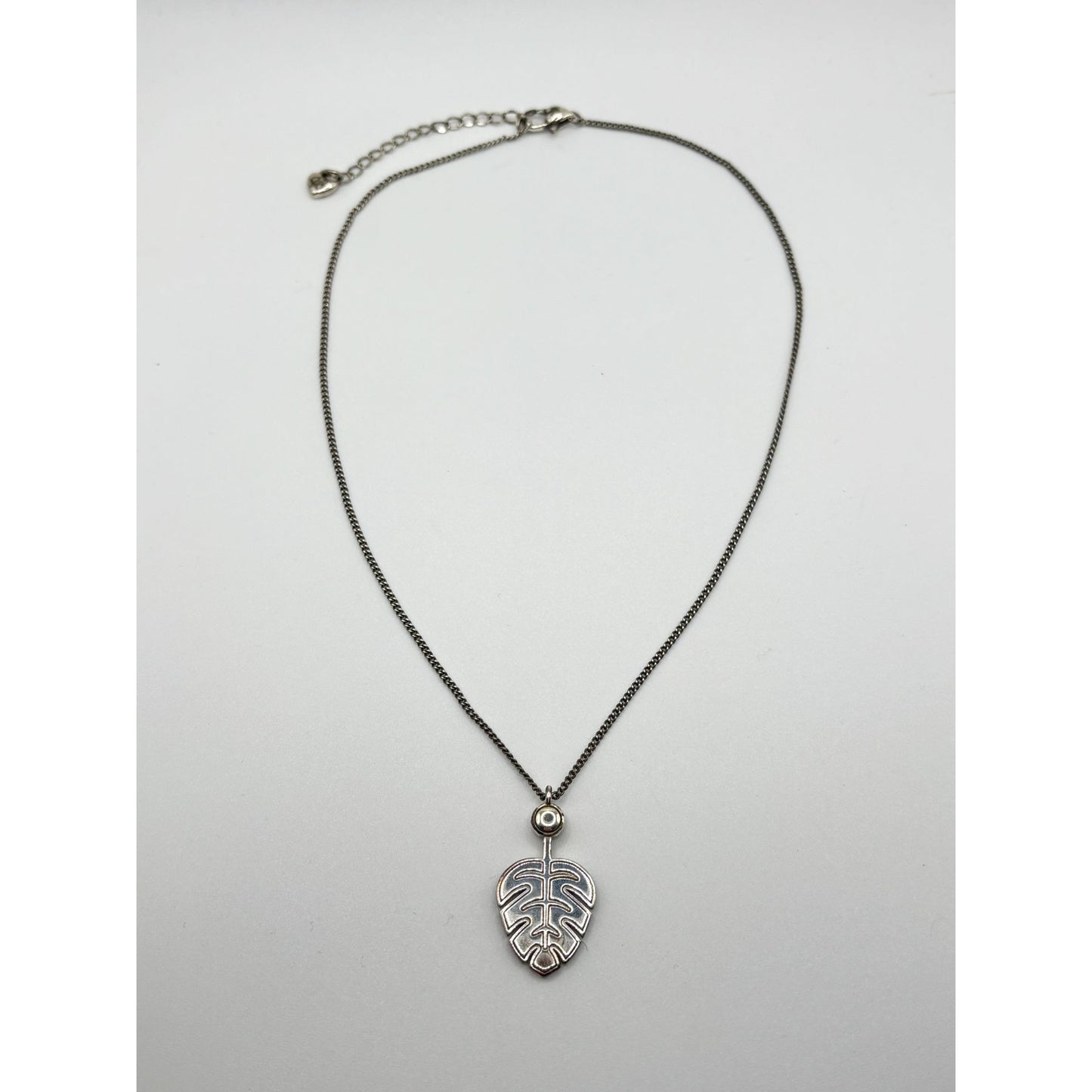 Elegant Safari Palm Leaf Pendant Necklace With Emerald Accent