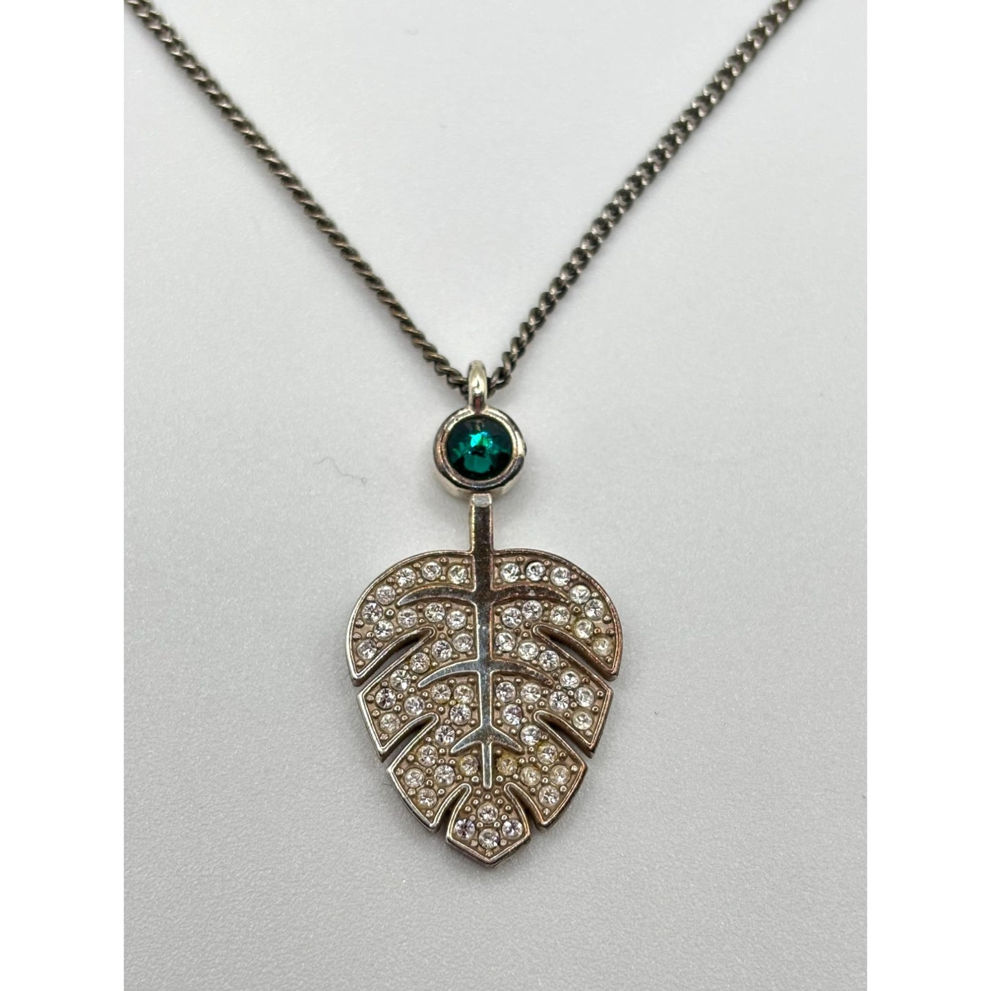 Elegant Safari Palm Leaf Pendant Necklace With Emerald Accent