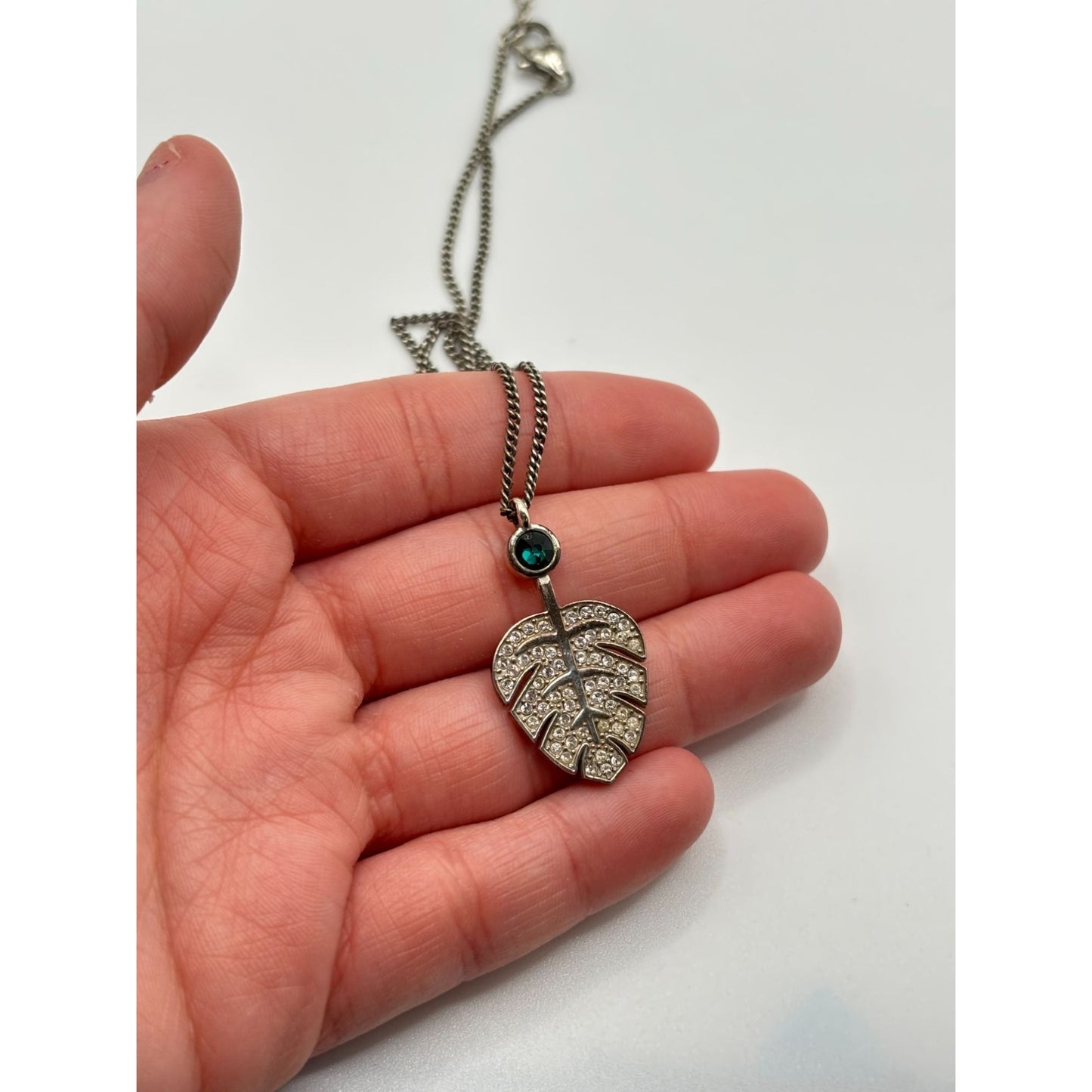 Elegant Safari Palm Leaf Pendant Necklace With Emerald Accent