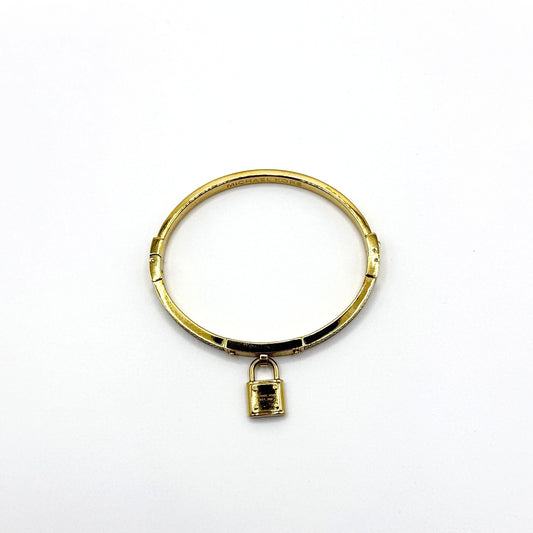 Michael Kors Goldtone Crystal Lock Hinged Bracelet With Pouch