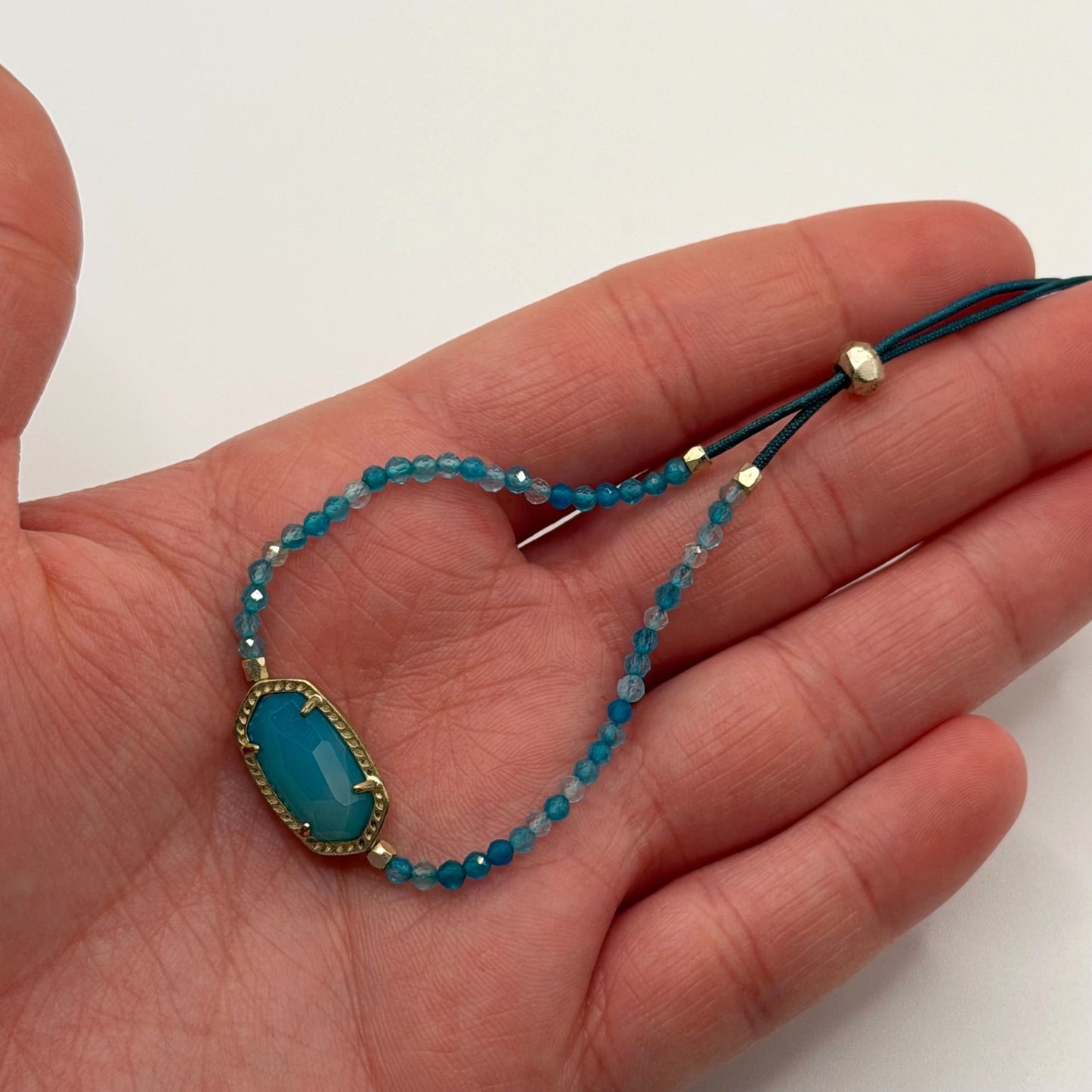 Kendra Scott Blue Beaded Adjustable Bracelet With Gold Oval Stone Accent