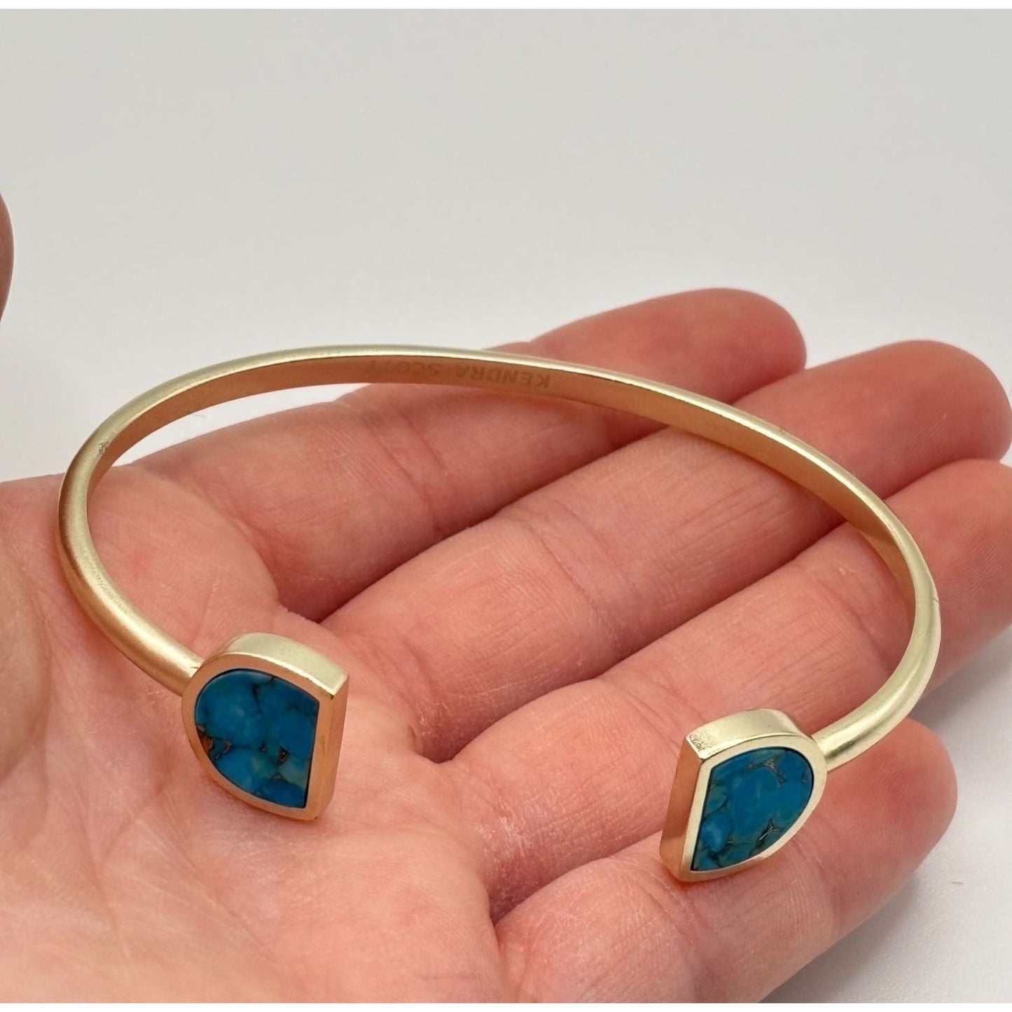 Kendra Scott Gold Tone Cuff Bracelet With Blue Stone Insets