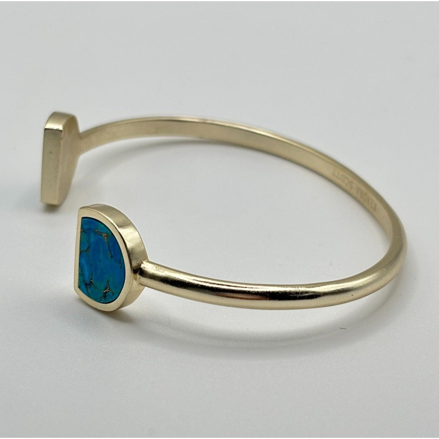 Kendra Scott Gold Tone Cuff Bracelet With Blue Stone Insets