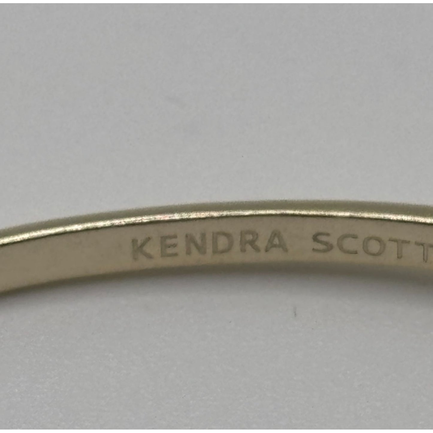 Kendra Scott Gold Tone Cuff Bracelet With Blue Stone Insets