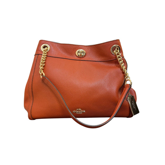 Coach Burn Orange Shoulder Bag With Turnlock Closure