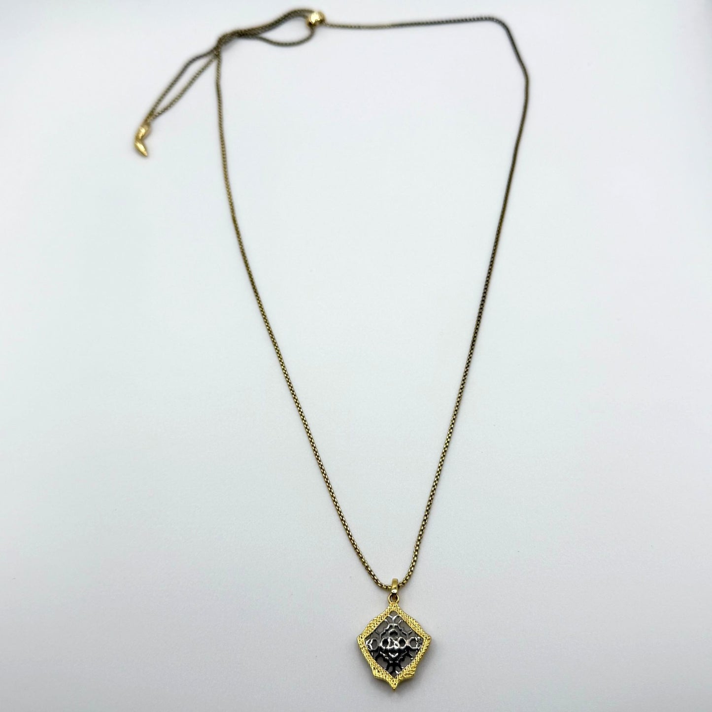 Kendra Scott Silver And Gold Tone Necklace With Intricate Filigree Floral Pendant