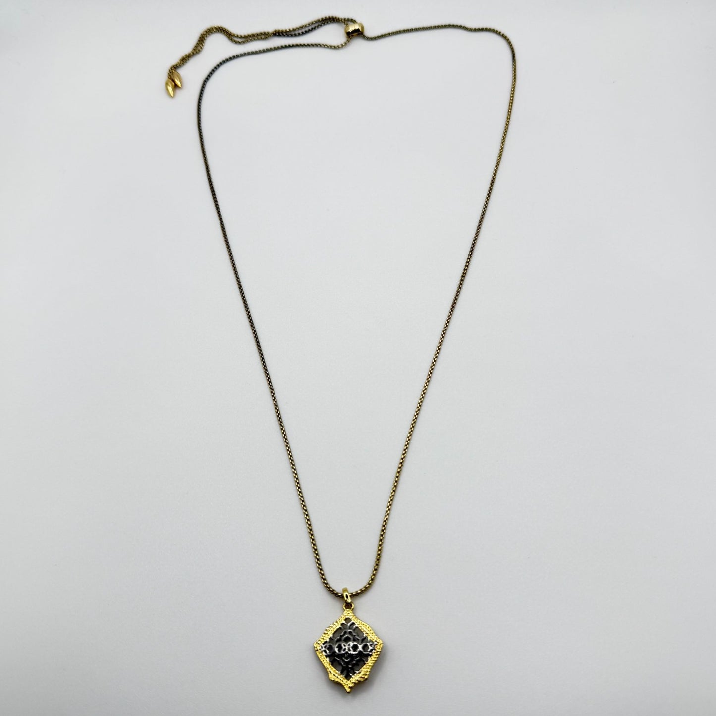 Kendra Scott Silver And Gold Tone Necklace With Intricate Filigree Floral Pendant