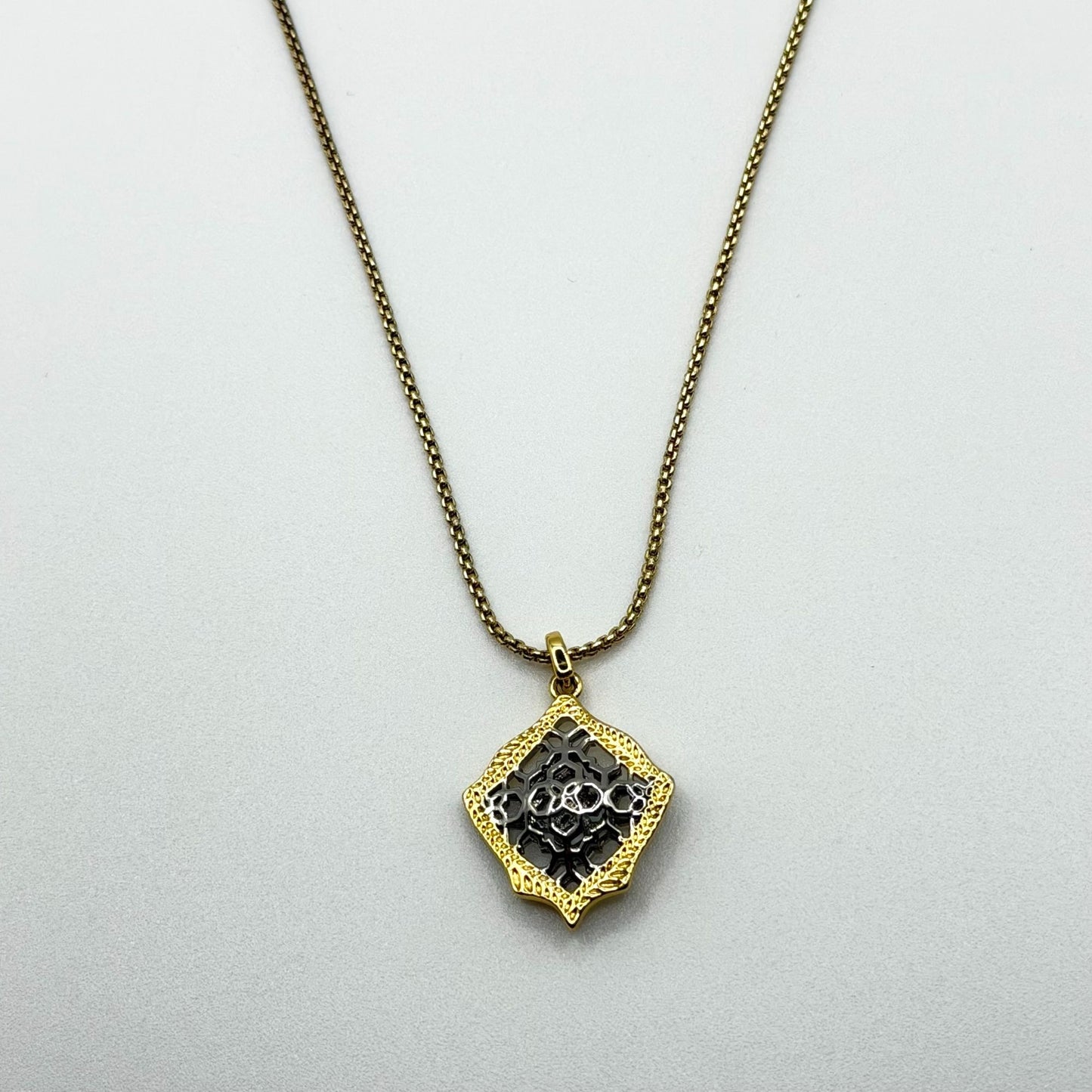 Kendra Scott Silver And Gold Tone Necklace With Intricate Filigree Floral Pendant