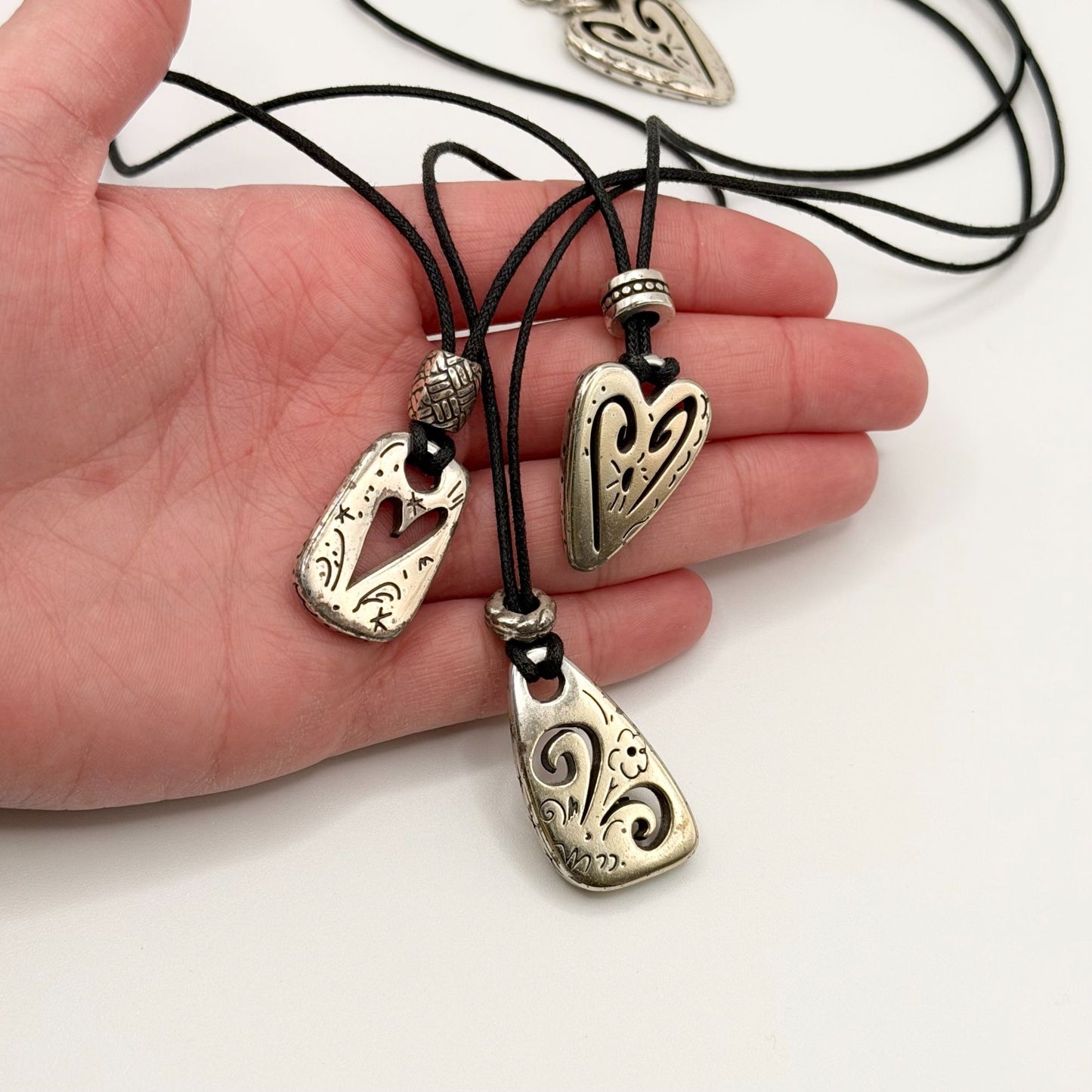 Brighton Brazilian Multi-Charm 3-Strand Black Cord Necklace With Heart Pendants