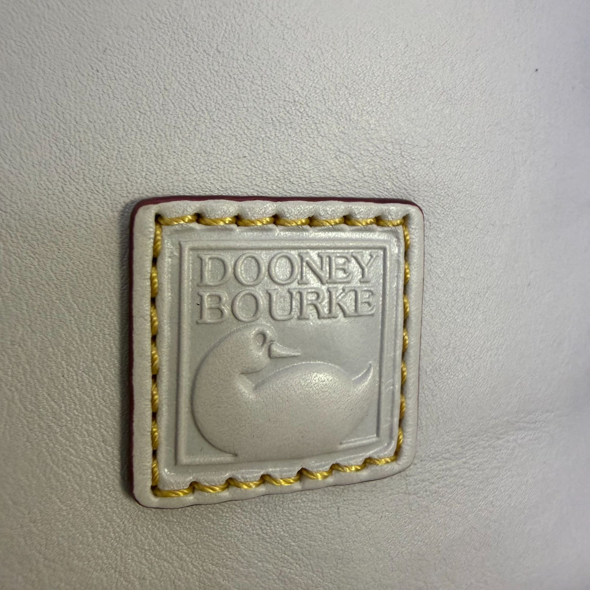 Dooney & Bourke Leather Drawstring Crossbody Bag Cream