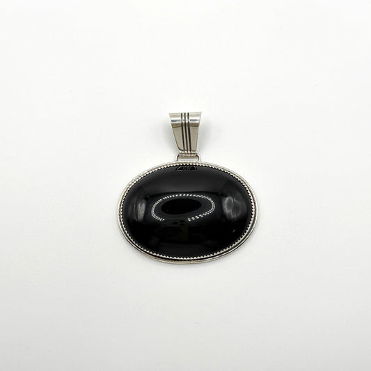 Loren Thomas Begay Sterling Silver Navajo Pendant With Oval Black Onyx Stone