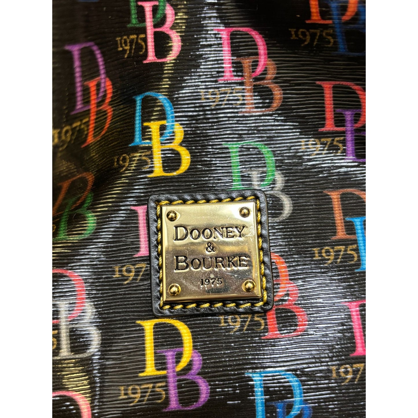Dooney & Bourke Shoulder Bag With Multicolor DB 1975 Logo Pattern & Leather Straps