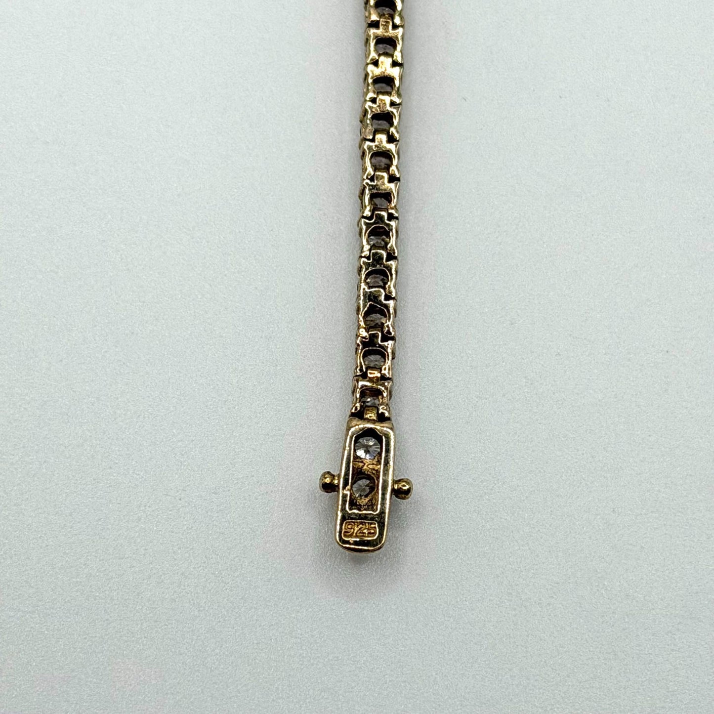 Gold Tone Bracelet With Round-Cut CZ Stones & 925 Clasp