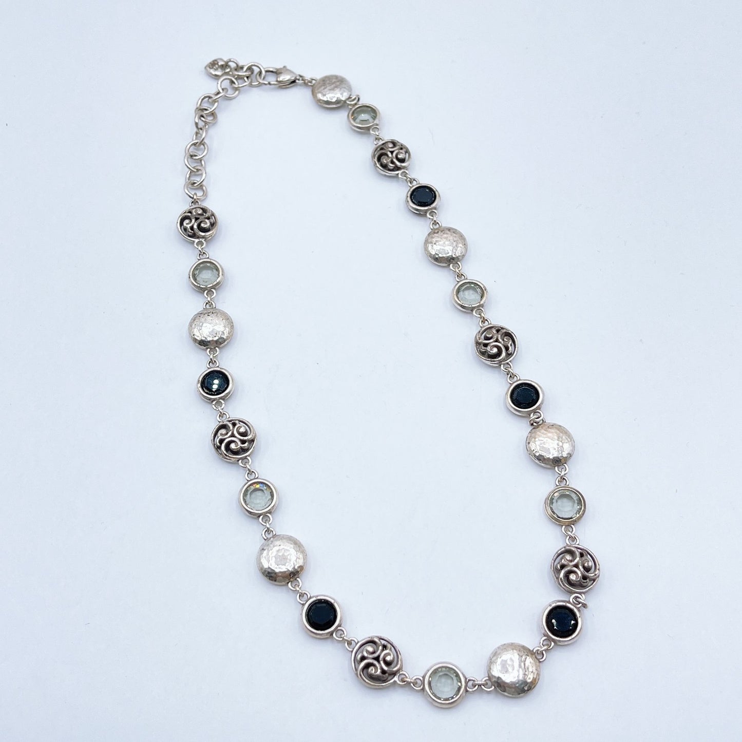 Brighton Necklace With Hammered Discs Swirl Accents & Black/Clear Gemstones