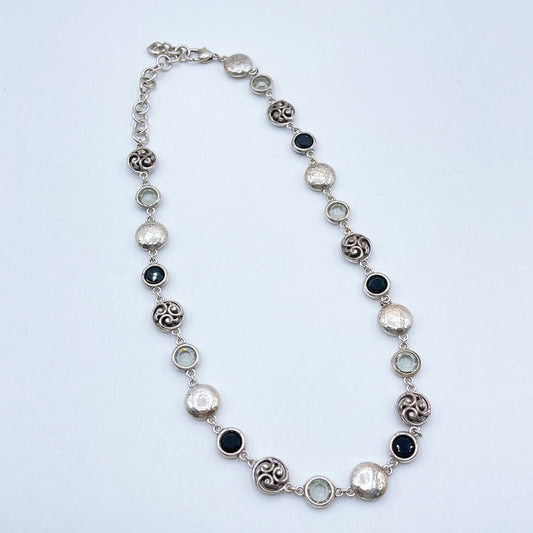 Brighton Necklace With Hammered Discs Swirl Accents & Black/Clear Gemstones