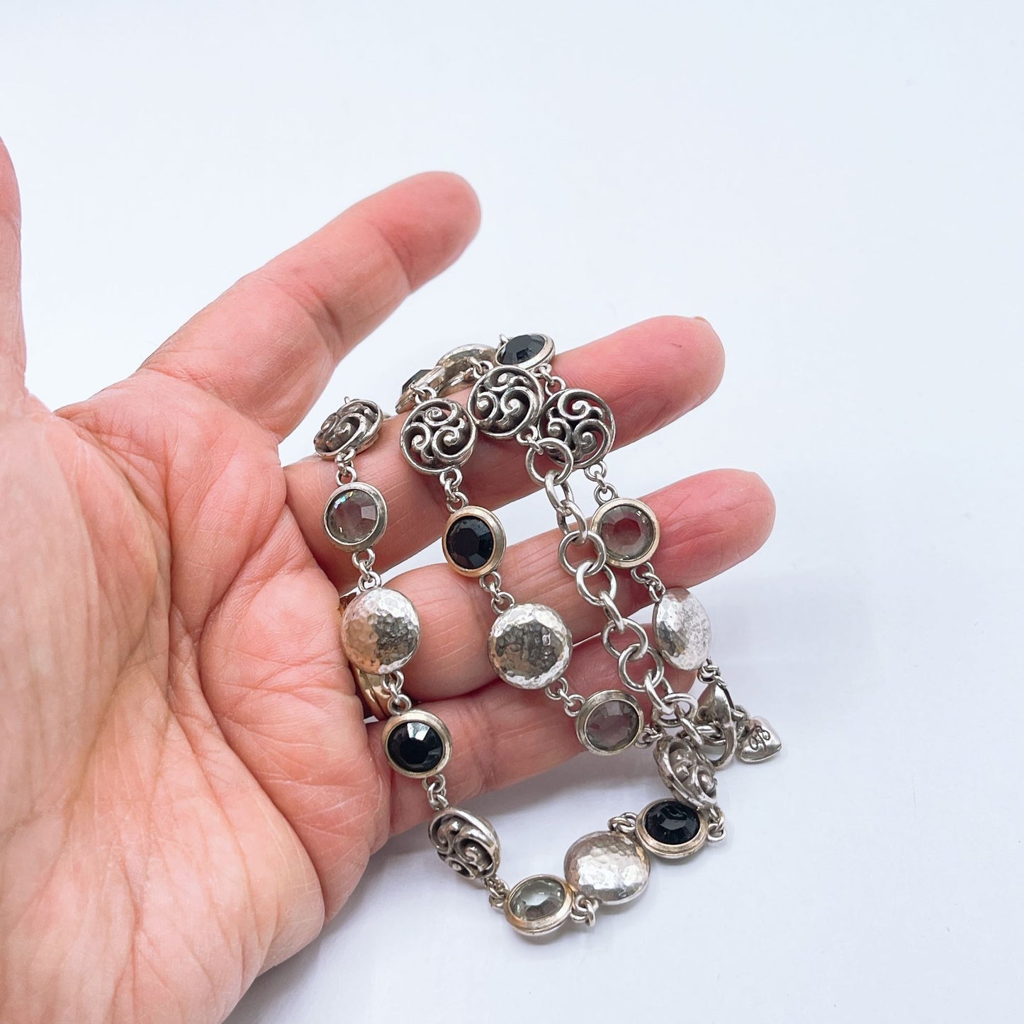 Brighton Necklace With Hammered Discs Swirl Accents & Black/Clear Gemstones