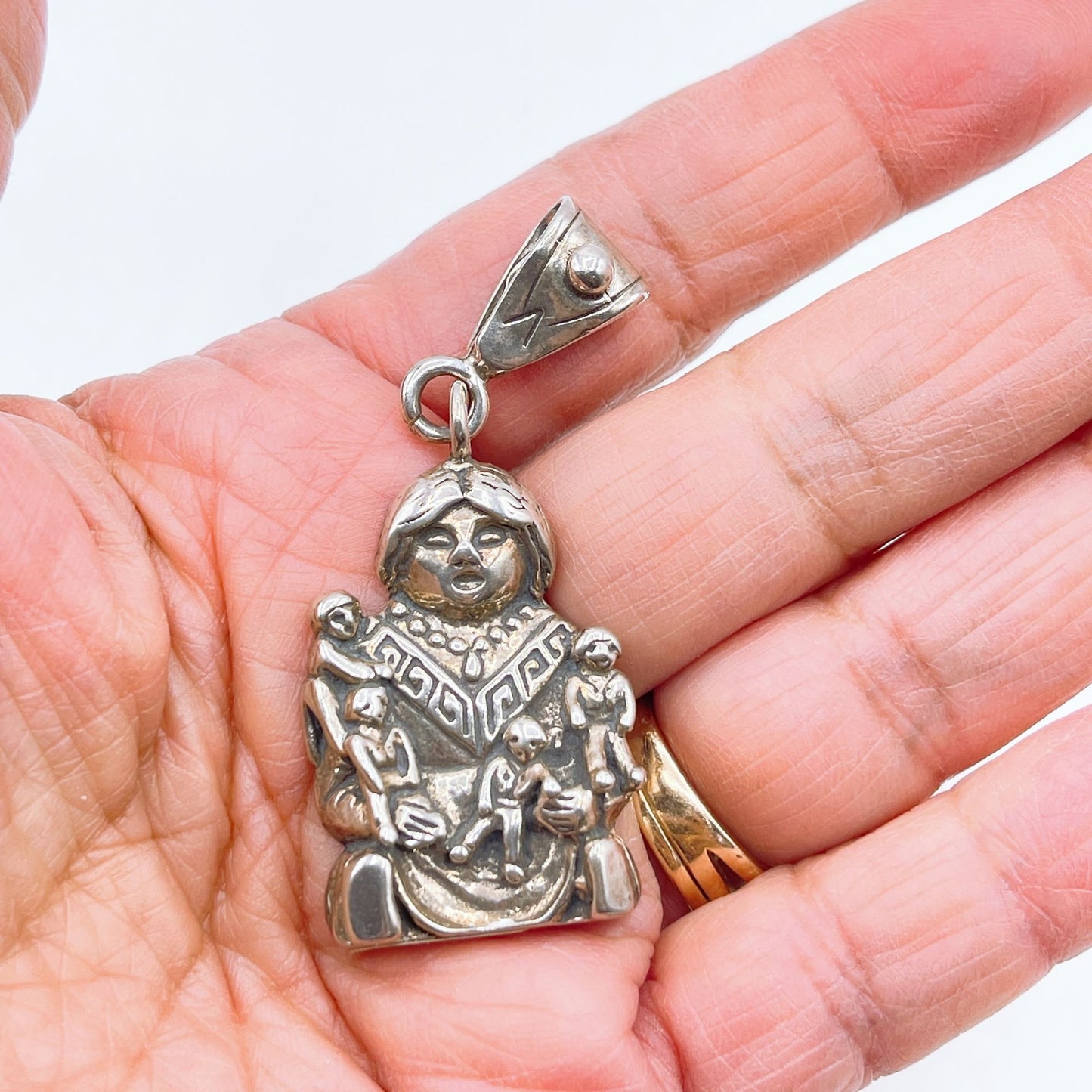 Native American Storyteller Sterling Silver Pendant With Intricate Detailing
