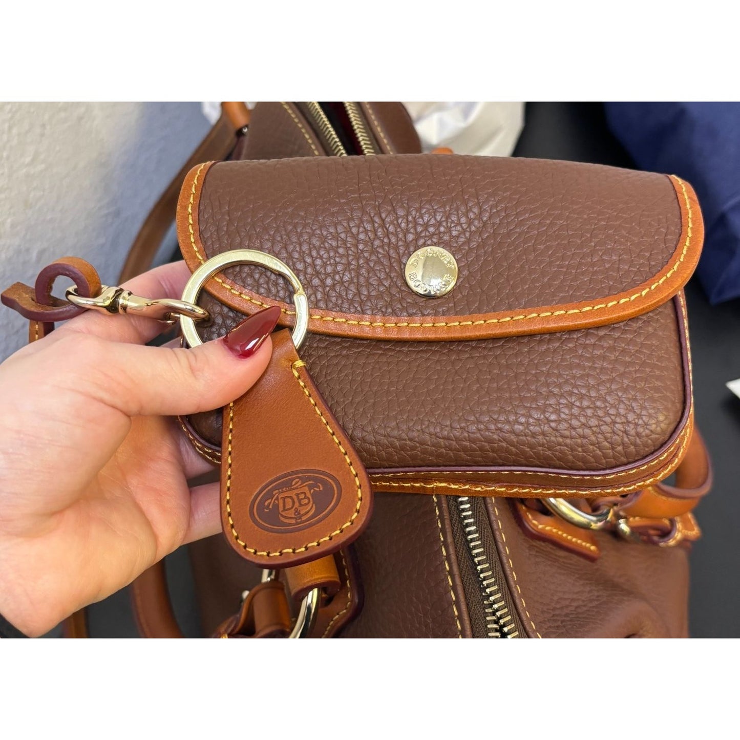 Dooney & Bourke Pebble Leather Satchel Bag With Adjustable Strap & Tassels - Brown